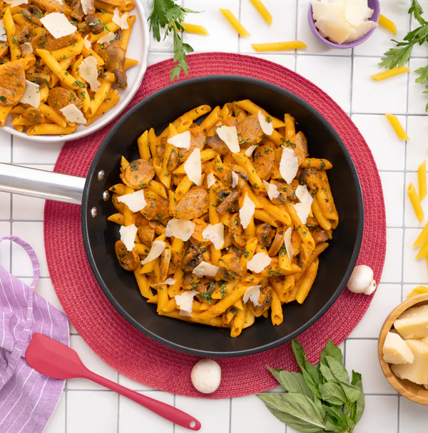 Creamy Sausage + Penne in Rose Sauce with basil and parmesan